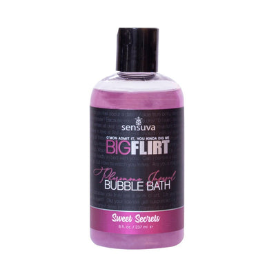 Bottle of Big Flirt pheromone infused bubble bath in Sweet Secrets scent, 8 fl oz with purple liquid and black cap.
