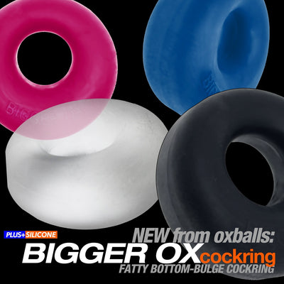Four thick, padded cockrings in pink, blue, white, and black made of soft PLUS+silicone displayed on black background.