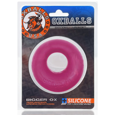 Oxballs Bigger Ox thick pink silicone TPR blend cockring in clear retail packaging with logo and product details.