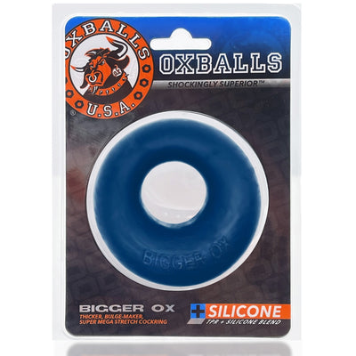 Blue Bigger Ox thick cockring in clear plastic packaging with Oxballs logo and silicone TPR blend label.