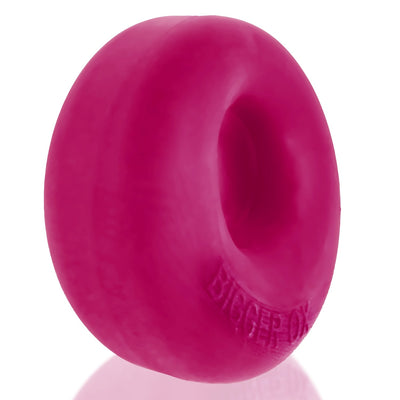 Thick, soft pink silicone cockring with a smooth, padded design and embossed Bigger Ox branding.