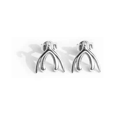 Pair of sterling silver earrings shaped with an anatomically inspired design, featuring secure post backings.