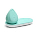 Biird Evii personal massager in mint green with ergonomic teardrop shape on matching wireless charging tray.
