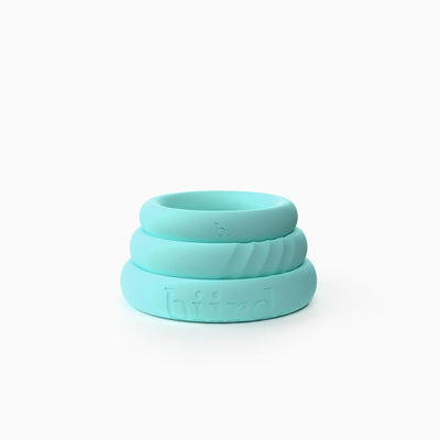 Set of three mint-colored silicone C-rings in varying sizes stacked on a white background.
