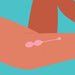 Illustration of a person holding a pink dual rose quartz yoni egg set against a blue background.