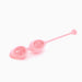 Pink silicone kegel exerciser with two rose quartz stones embedded inside each egg-shaped section.