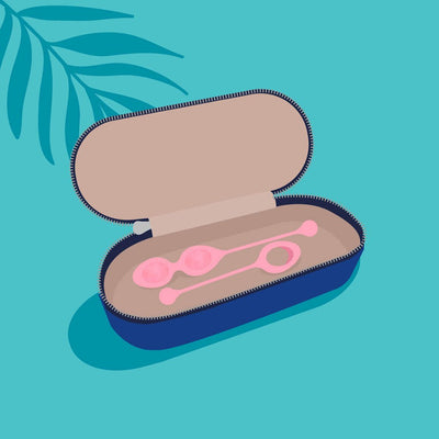Blue zippered case open to reveal two pink wellness eggs with a connecting string inside on a teal background.