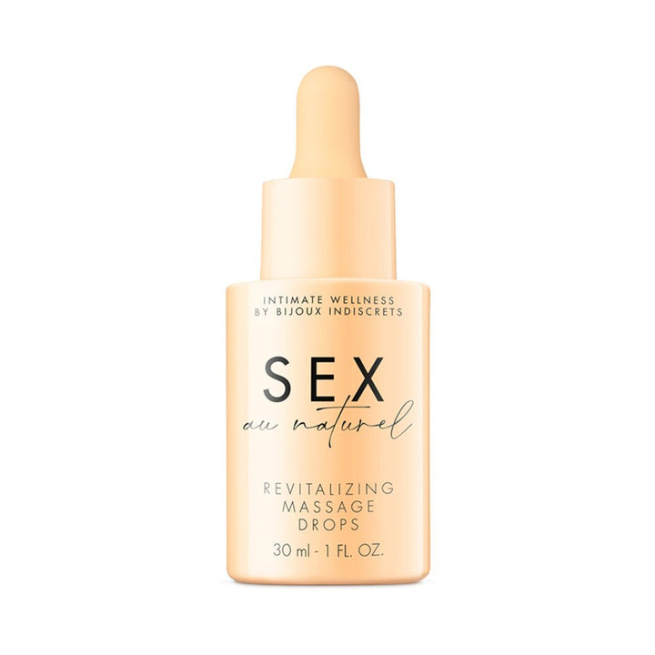 Bijoux Indiscrets Sex au Naturel revitalizing massage drops in a 30ml peach-colored bottle with dropper.
