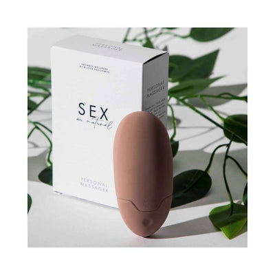 Bijoux Indiscrets Sex au Naturel personal massager in muted pink with white packaging and green leaves background