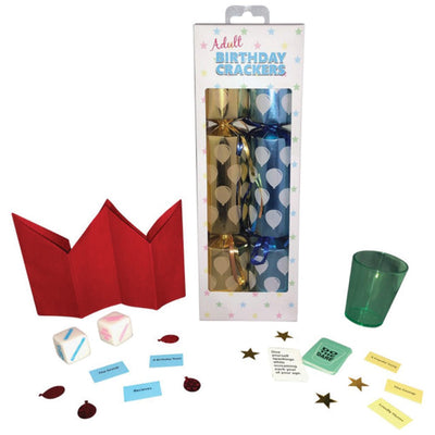 Birthday Crackers party pack with red crown, dice, shot glass, confetti, and drink or dare cards in festive packaging.