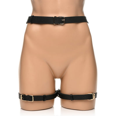 Black PU leather thigh harness with gold buckles and adjustable waist and thigh straps on a mannequin.