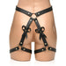 Black faux leather bondage thigh harness with adjustable straps and decorative bows on a mannequin's lower body.