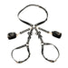 Black adjustable bondage thigh harness with wrist cuffs and decorative bows, made of faux leather with metal buckles.
