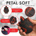 Hand holding a black and red rechargeable silicone rose-shaped stimulator with close-ups showing soft petals and travel-friendly size.