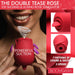 Red rose-shaped double tease stimulator held by a smiling person with purple nails, featuring powerful suction and licking modes.