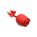 Red silicone rose-shaped clit stimulator with golden stem and fluttering butterfly detail on white background.