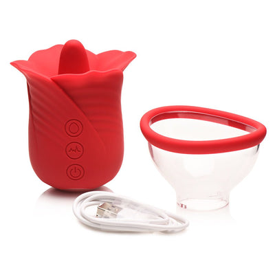 Red silicone flower-shaped personal massager with removable suction cup and USB charging cable on white background.