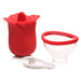 Red silicone flower-shaped personal massager with removable suction cup and USB charging cable on white background.