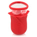 Red silicone flower-shaped personal massager with clear suction cup and control buttons on the front.