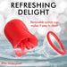 Red Bloomgasm Lily Lover with removable suction cup shown with water splash, highlighting IPX6 waterproof feature.