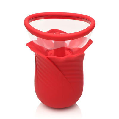 Red silicone flower-shaped adult toy with clear suction cup and textured petals.