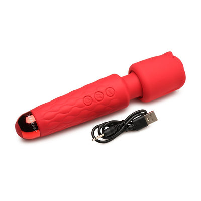 Red silicone rose-shaped wand massager with textured handle and USB charging cable on white background.