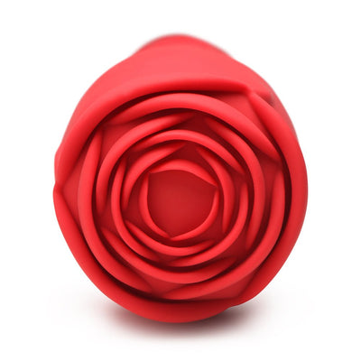 Close-up of red silicone rose-shaped attachment for a pleasure wand.