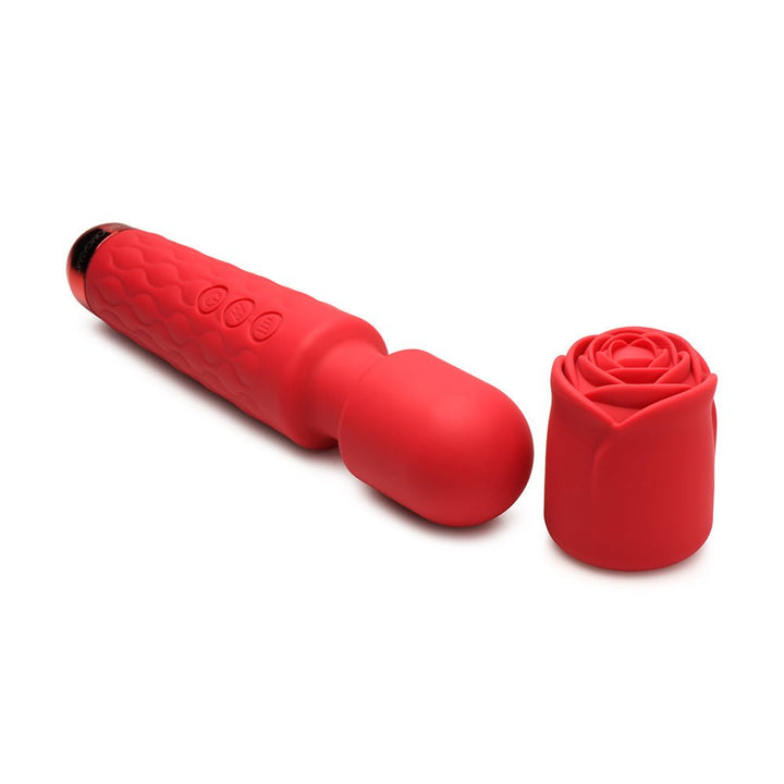 Red silicone wand massager with textured handle and detachable rose-shaped silicone cover on white background.