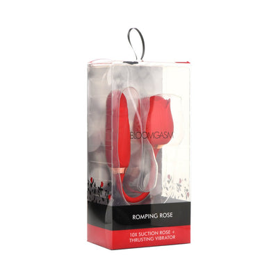 Bloomgasm Romping Rose Red vibrator in clear packaging showing rose-shaped suction and thrusting vibrator.