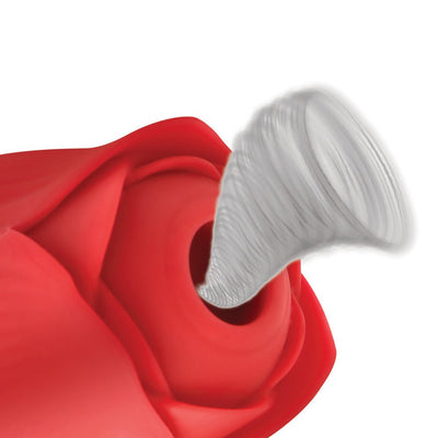 Close-up of red silicone rose vibrator with suction feature shown emitting air flow from the center.