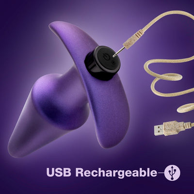 Astro violet USB rechargeable anal plug with ergonomic design and smooth finish on purple background.