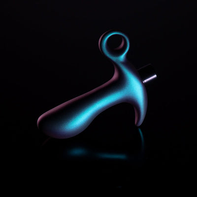 Lunar blue Blush Anal Adventures Matrix Teleportation Plug with ergonomic shape and ring base on black reflective surface.