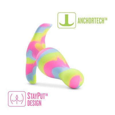 Colorful lime, pink, and blue silicone plug with tapered shape and curved base, featuring StayPut and AnchorTech design.
