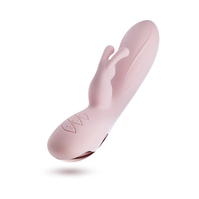 Blush pink dual-stimulation rabbit vibrator with smooth silicone surface and ergonomic control buttons.
