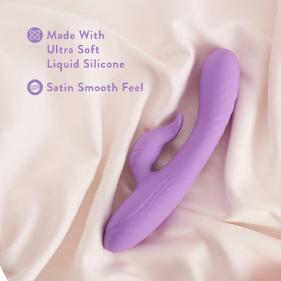 Purple Blush Evelyn Rabbit Vibrator on soft fabric highlighting ultra-soft liquid silicone and satin smooth feel.