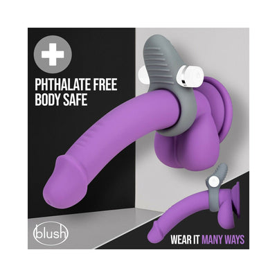Purple silicone wearable ring with textured gray silicone attachment and removable white bullet vibrator, shown mounted and angled.