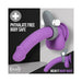 Purple silicone wearable ring with textured gray silicone attachment and removable white bullet vibrator, shown mounted and angled.