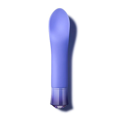 Sleek purple silicone vibrator with a curved, cupped head and faceted base, designed for clitoral stimulation.