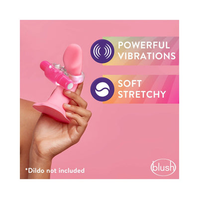 Hand holding a clear vibrating C-ring on a pink dildo with text highlighting powerful vibrations and soft stretchy material.