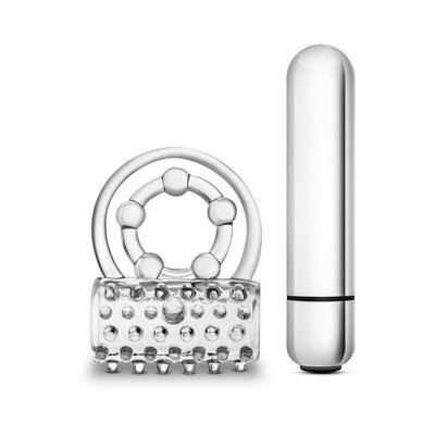 Clear textured dual-ring cock ring with removable silver bullet vibrator.