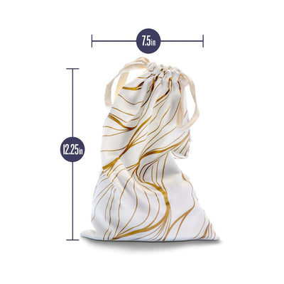 White cotton drawstring toy bag with gold abstract lines, measuring 7.5 by 12.25 inches, soft and lint-free fabric.