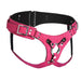 Pink deluxe leather corset harness with adjustable straps, metal buckles, and central metal O-ring detail.