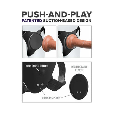 Body Dock G-Spot Pro strap-on harness showing suction-based dildo attachment, power button, charging ports, and rechargeable remote.