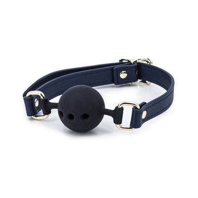 Black silicone ball gag with navy blue adjustable PU synthetic strap and gold-tone nickel-free hardware on white background.