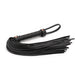 Black synthetic leather flogger with wrapped handle and wrist loop, featuring multiple flat tails for bondage play.