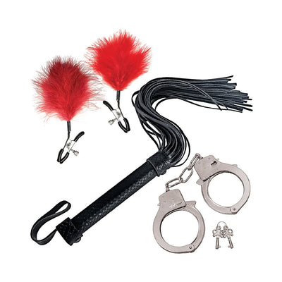Set of black faux leather flogger, metal handcuffs with keys, and red feather-tipped nipple clamps on white background.