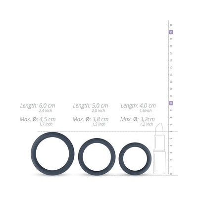 Three black cock rings in small, medium, and large sizes with measurements shown next to a lipstick for scale.