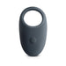 Sleek dark gray vibrating cock ring with a power button on the front, designed for comfort and enhanced pleasure.