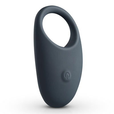 Sleek black vibrating cock ring with smooth silicone finish and power button on front for adjustable pleasure settings.