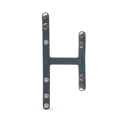 Black T-shaped adjustable ball splitter with metal snap buttons on a white background.